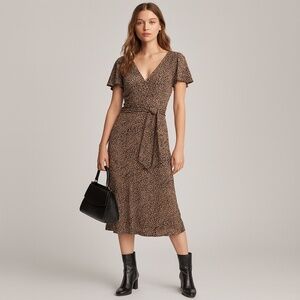 VTG Traces by Tracy Evans Flirty Animal Print Midi Length Dress with Tie Sash